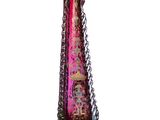 a glass vase that is sitting on a stand