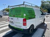a van that is parked on the side of the road