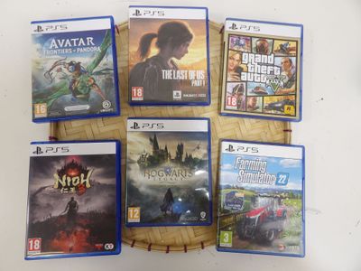 de nombreux jeux vidéo sur la table et sur la table
