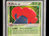 a close up of a pokemon card with a red hat on it