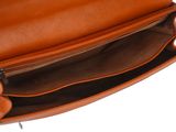 the inside of a brown leather purse with a zipper