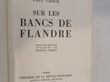 the book is open on a white surface with a black and white title