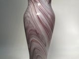 a picture of a vase that is on a table