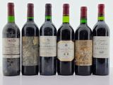 plusieurs bouteilles de vin sont alignées dans une rangée