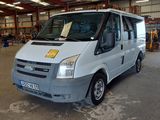 a white van that is parked in a warehouse