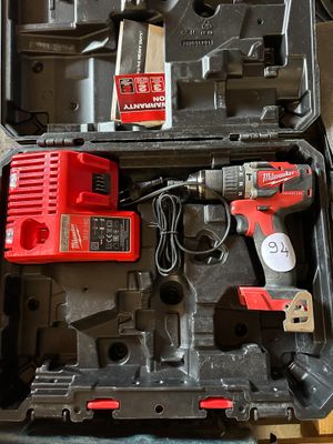 a box with tools in it sitting on a table