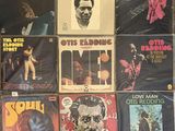 a lot of records that are on the floor