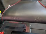 a close up of a bench with a seat on it
