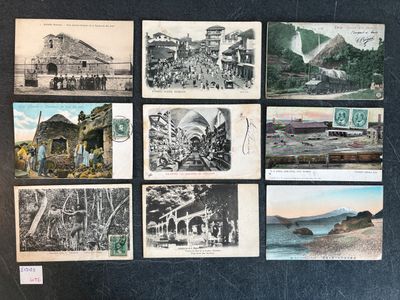 many old postcards on the wall of a building
