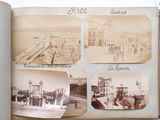 an open book with pictures of a city in it