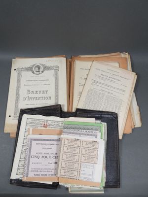 some old books are stacked on top of each other on a table