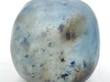 an image of a blue and white glass object
