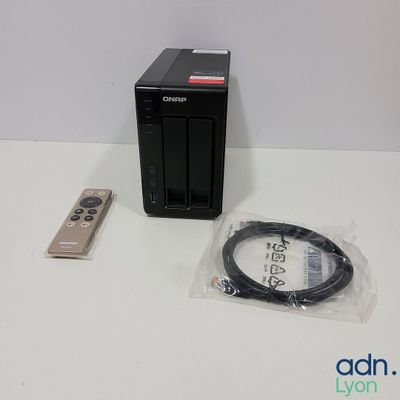 an image of a small device and a remote control