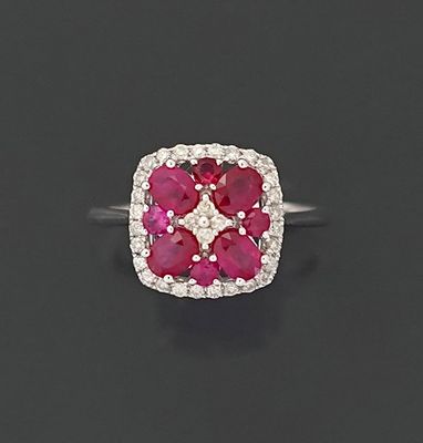 Bague en or gris 18K 750 millièmes, le panier de forme carré…