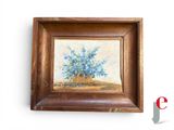 a picture of a painting of a tree in a wooden frame