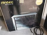 a box that is sitting on the floor next to a computer