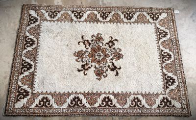a close up of a rug on the floor in a room