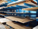 many shelves that are filled with different types of wood