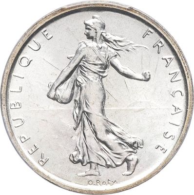an image of a silver coin with a lady on it