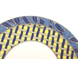 a plate with a blue and yellow design on it