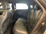 the back seats of a car with a seat belt in the back