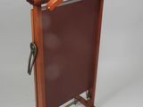 an image of a wooden clothes rack with a coat hanger on it