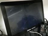 a laptop computer sitting on top of a desk
