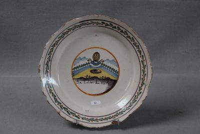 a white plate with a picture of a bridge on it