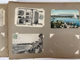 an old photo of a book with pictures on it