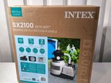 the box is open to show the contents of a water fountain