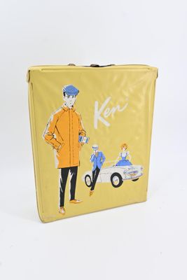 a yellow suitcase with a picture of a man and a car on it