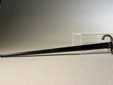 a sword that is sitting on a table