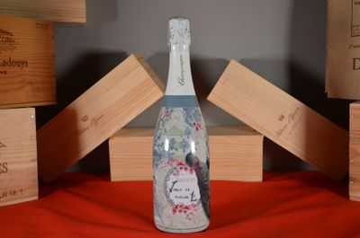 a bottle of wine that is sitting on a table