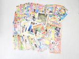 a lot of disney comics on the table