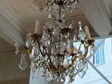 a chandelier hanging from the ceiling in a room