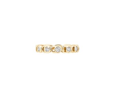 a yellow gold ring with three diamonds on top