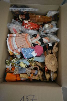 a cardboard box filled with assorted items for sale