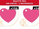 a pair of pink heart shaped tags on a white background