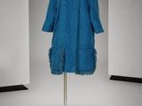 une image d'une robe bleue sur un mannequin