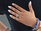 a woman that has a ring on her finger