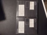 two boxes that are sitting on a table