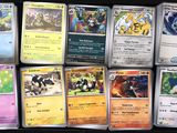 a lot of pokemon cards that are on the table