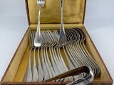 a wooden box with a set of silverware in it