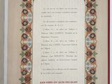 an open book with a picture of an ornate design on it