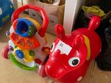 two toys that are sitting on the floor next to each other