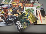 a lot of comic books on the table