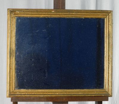 a picture of a mirror that is on a stand