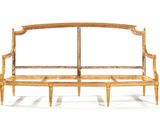 a wooden bench that is sitting on a white surface