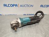 a small electric drill is sitting on top of a table