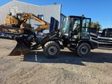 a picture of a tractor with a backhoe and a backhoe